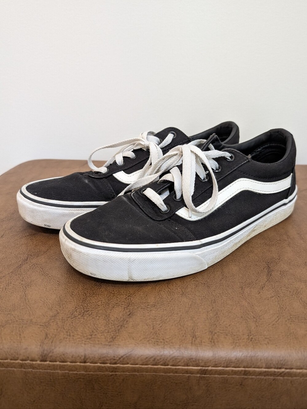Vans black and white low cut sneakers